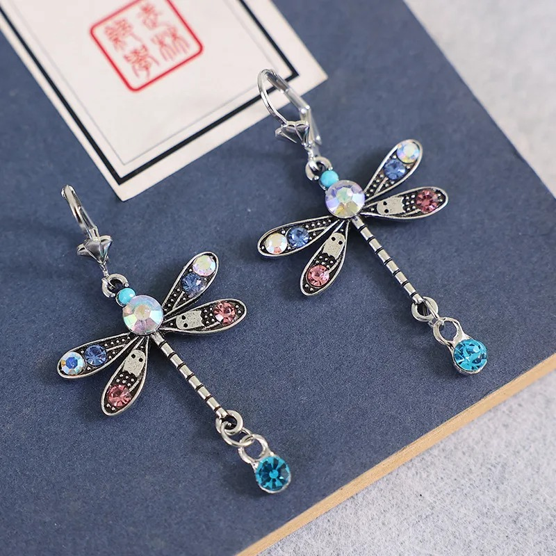 Elegante Gesneden Dragonfly Oorbellen | Zilver